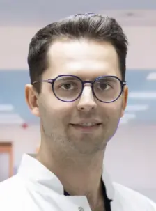 Dr. Tiberiu Almasan