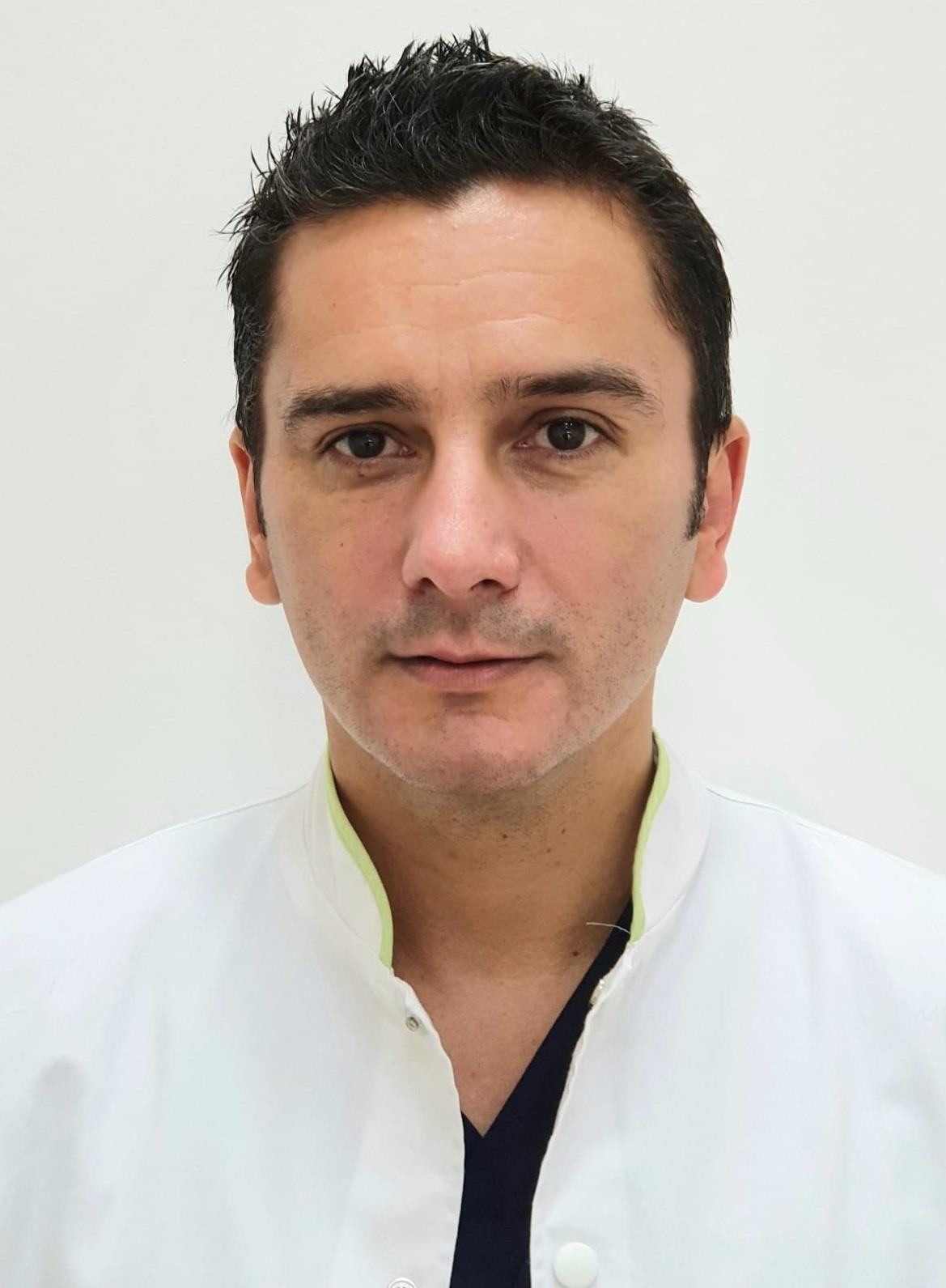 Dr. Costin Gabriel Mitroi