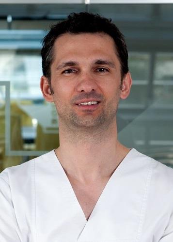Dr. Alexandru Dinu SANADOR 