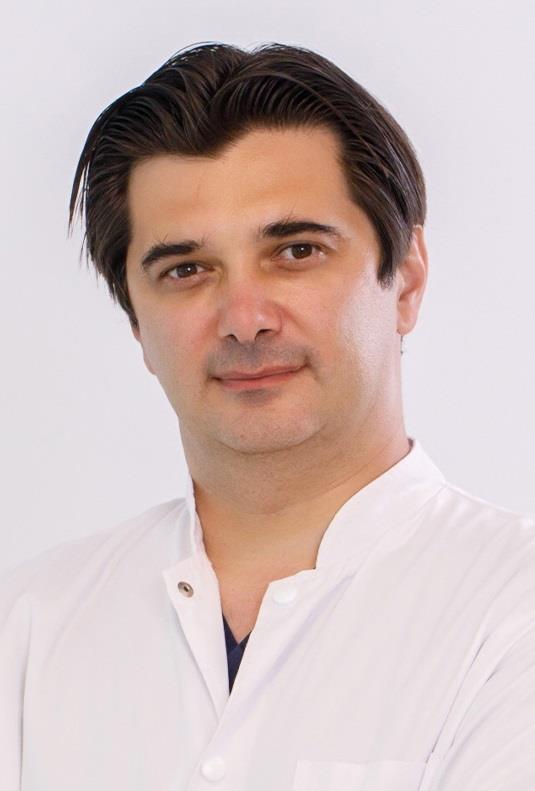 Dr. Razvan Adam